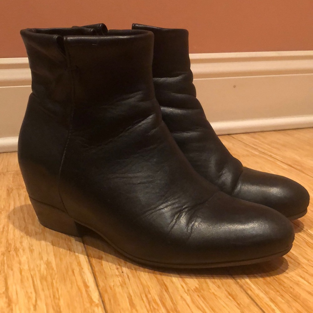 Black leather booties with hidden heel